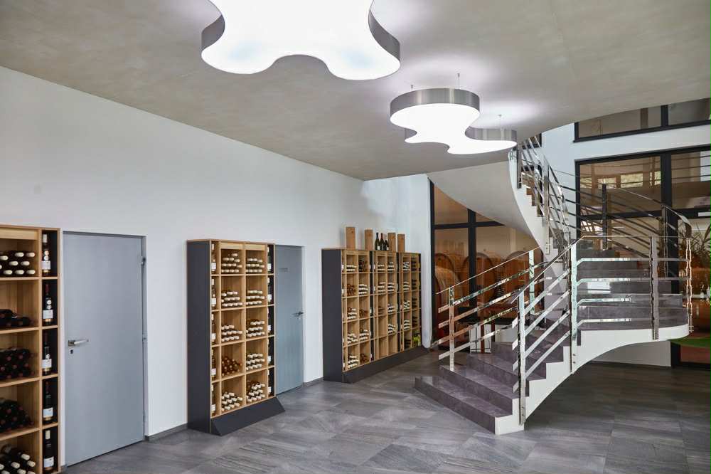 A fireside room with wine close at hand.